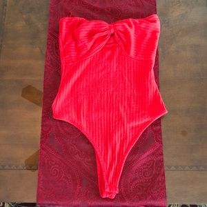 Red body suit